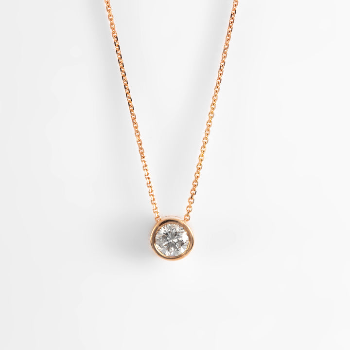 Rose gold bezel set diamond pendant