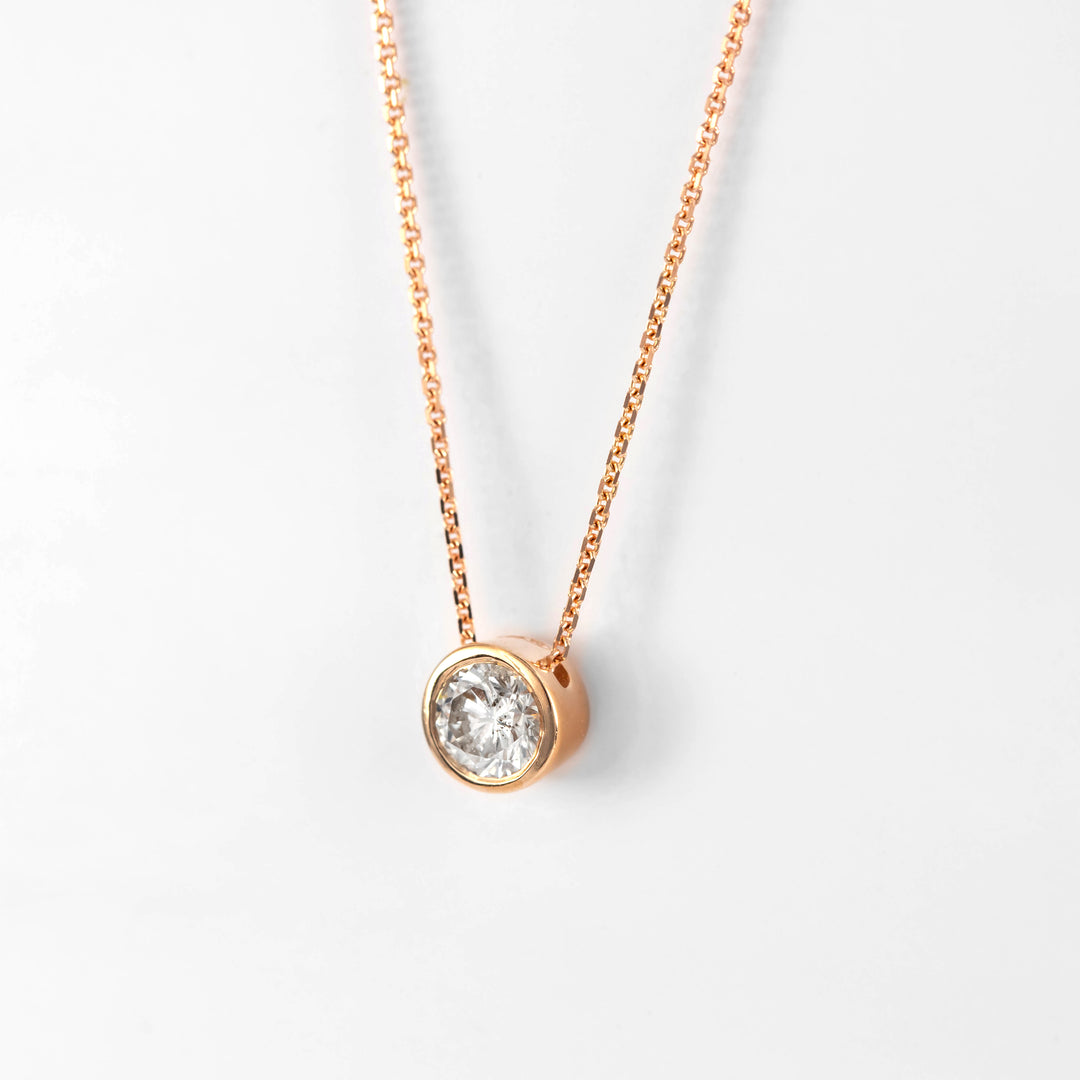 Rose gold bezel set diamond pendant