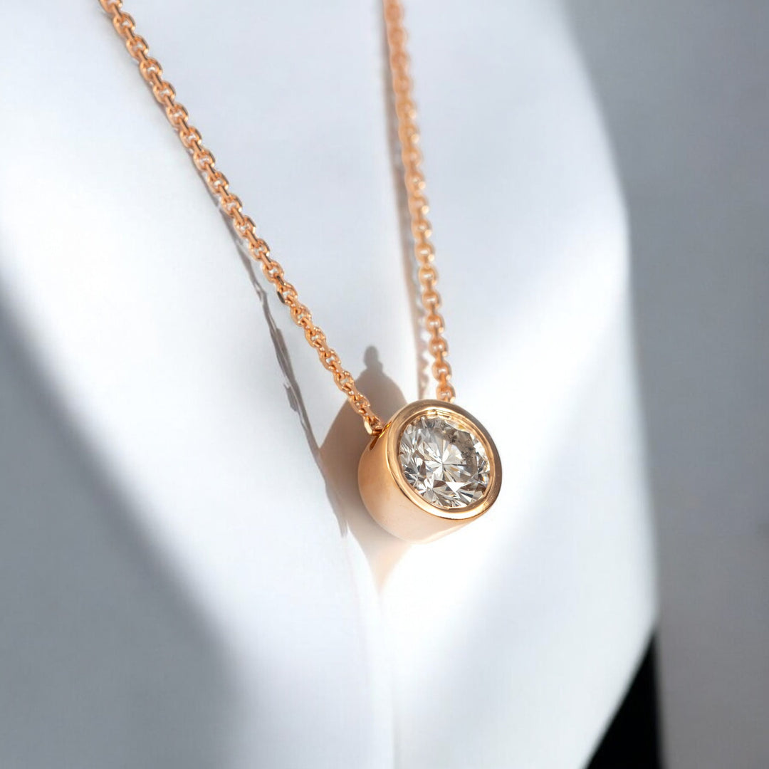 Rose gold bezel set diamond pendant
