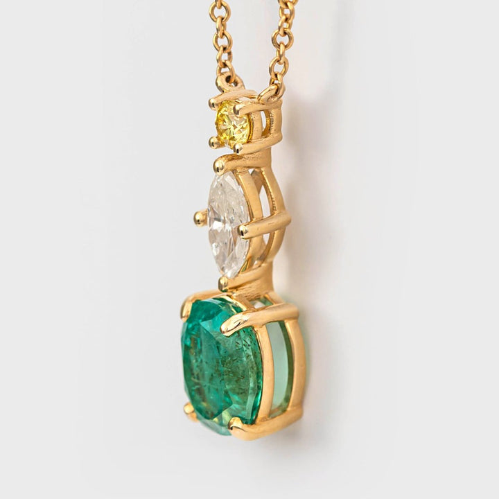 Oval shape Emerald and two Diamonds Pendant