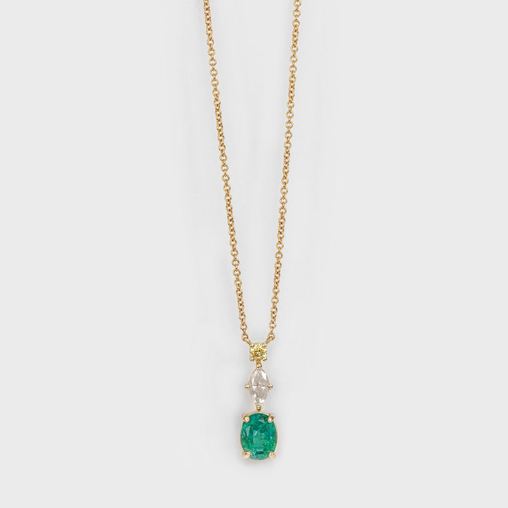 Oval shape Emerald and two Diamonds Pendant
