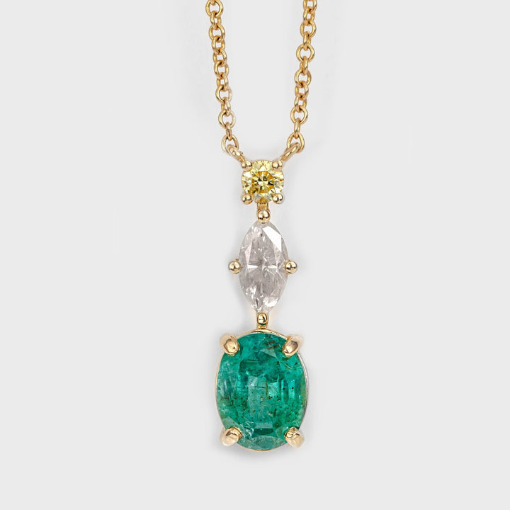 Oval shape Emerald and two Diamonds Pendant