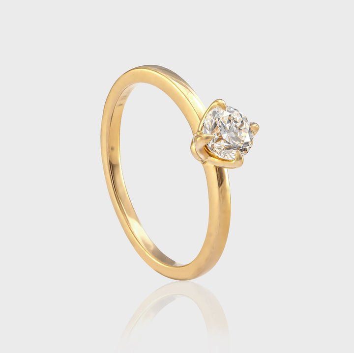 Delicate 4 prongs half carat diamond solitaire