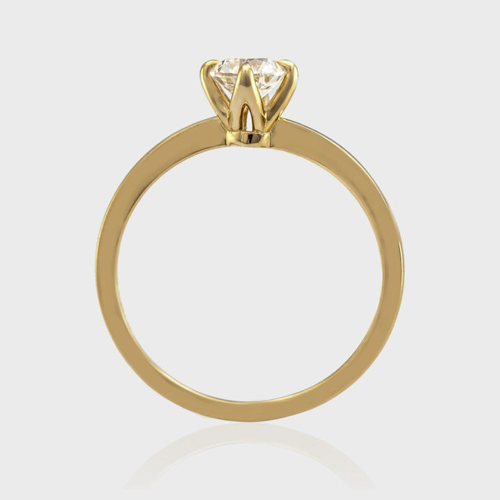 Delicate 4 prongs half carat diamond solitaire
