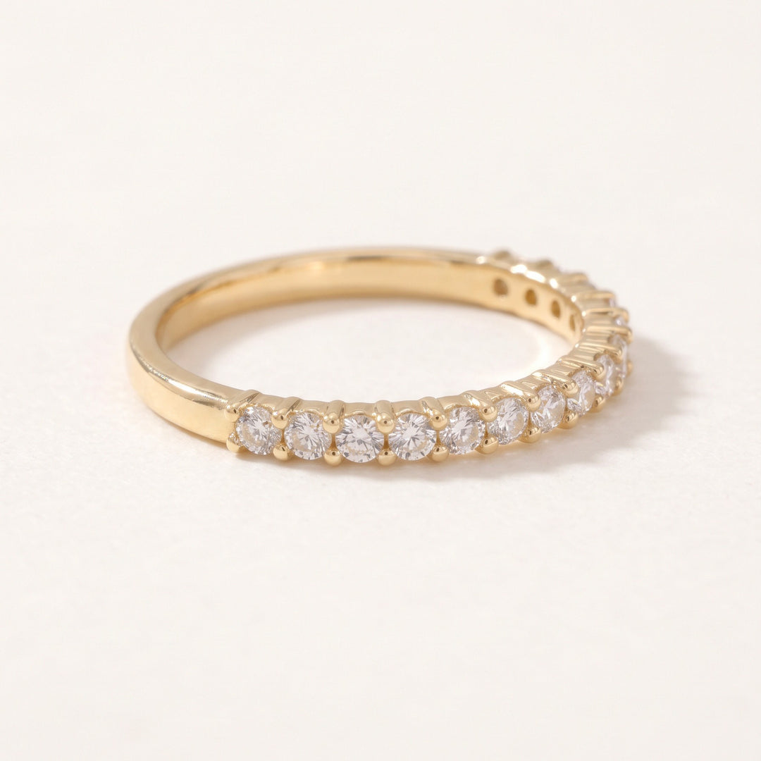 Thirteen diamond half eternity ring in 14K yellow gold — side view