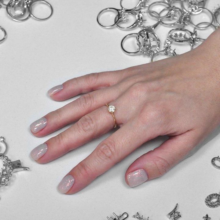 Six Prong Delicate Solitaire Engagement Ring