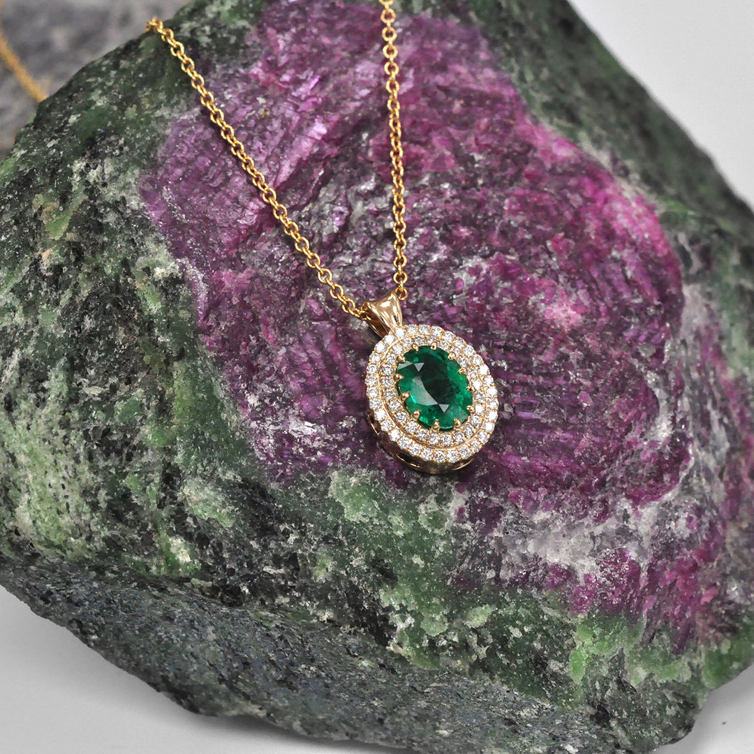 Oval Green Emerald and Diamonds Double Halo Pendant