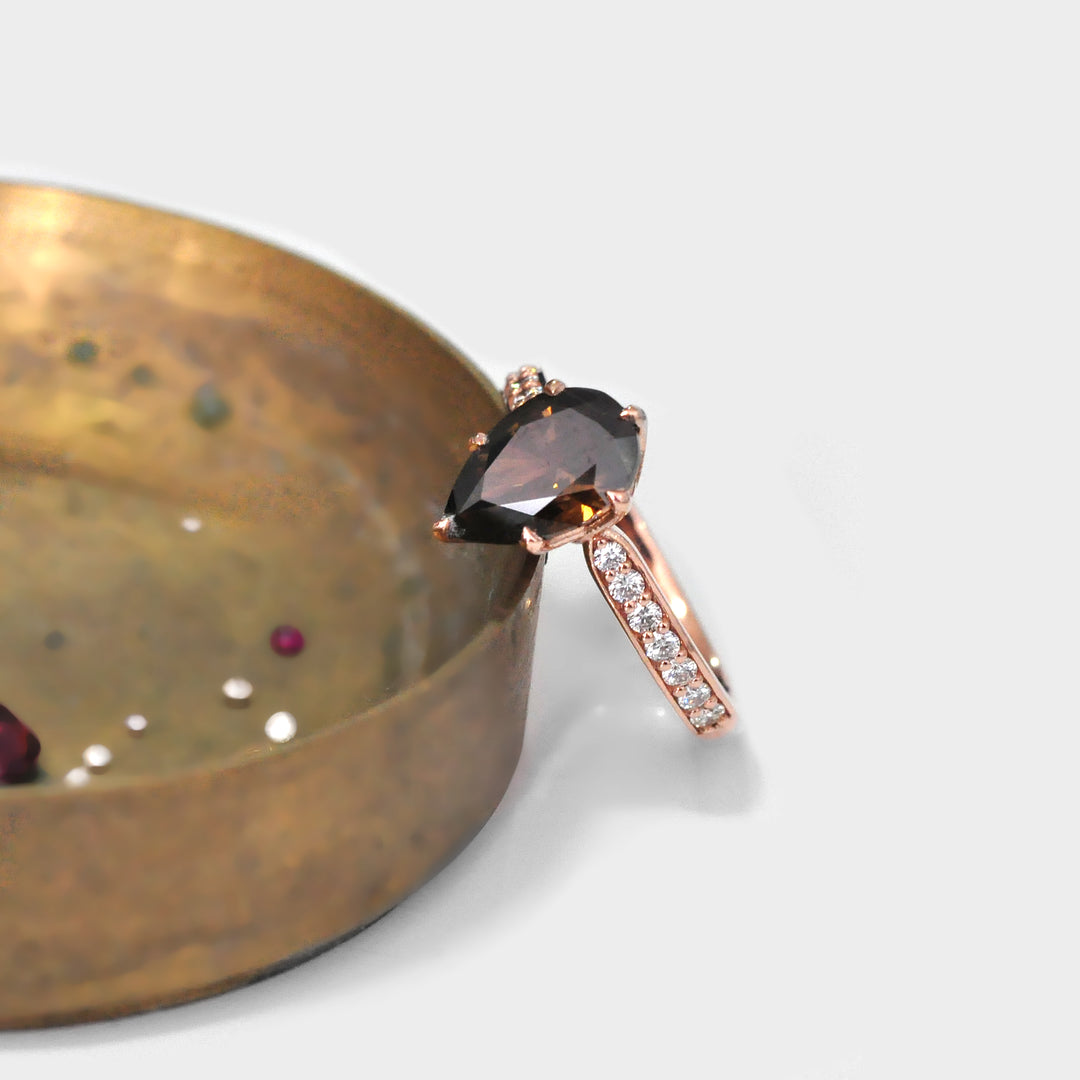 Dark brown Pear shape Diamond Ring with side diamonds
