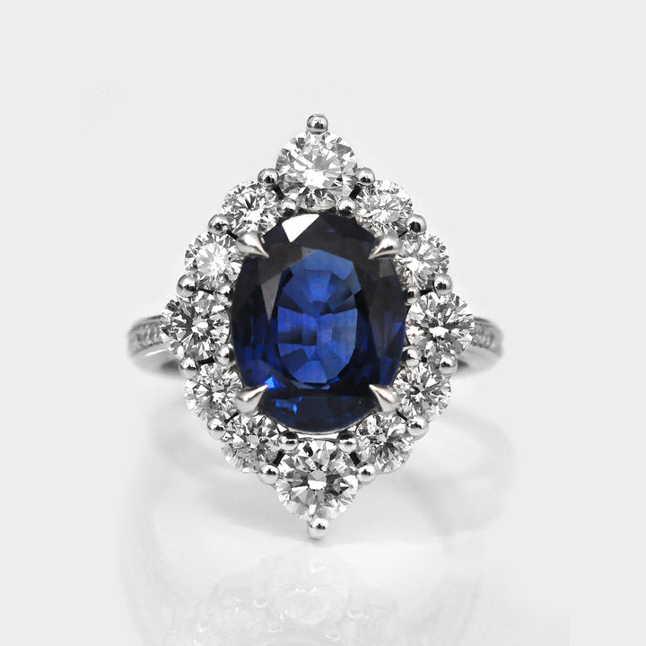 Oval Cut Blue Sapphire and white Diamonds magnificent Ring