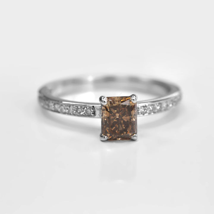 Fancy Brown Radiant Diamond and Side Diamonds Ring.