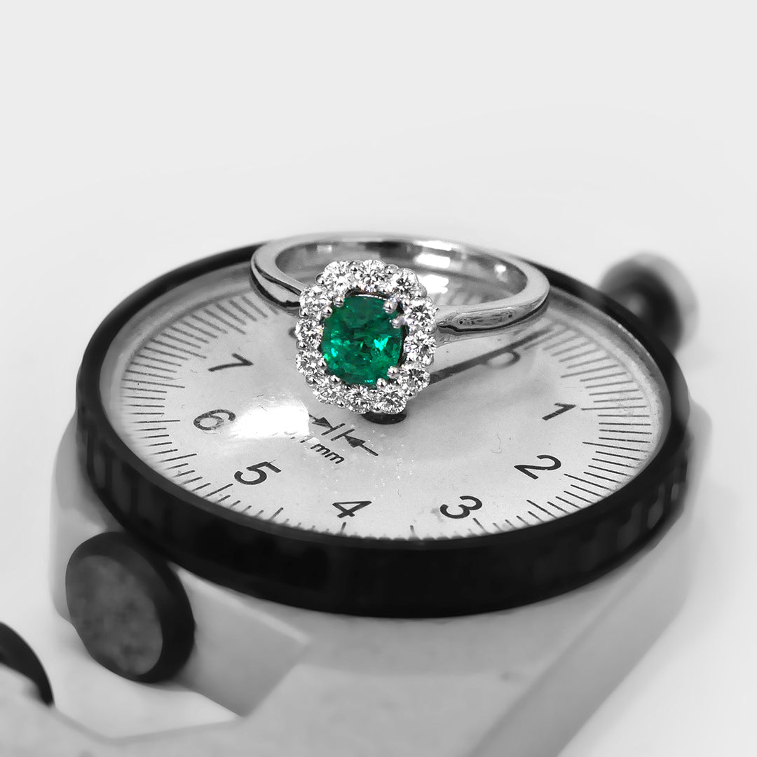 18k White Gold Cushion cut Emerald and Halo Diamonds Ring