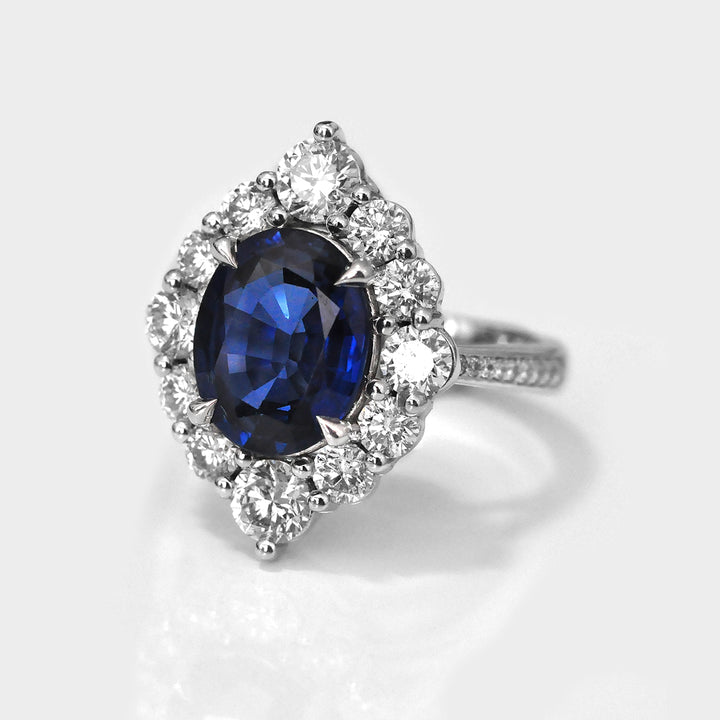 Oval Cut Blue Sapphire and white Diamonds magnificent Ring