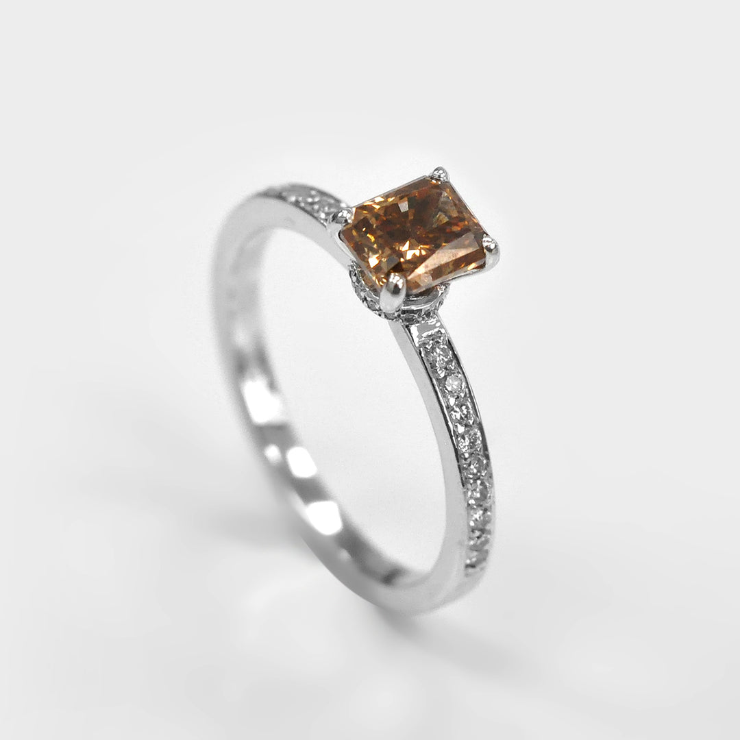 Fancy Brown Radiant Diamond and Side Diamonds Ring.