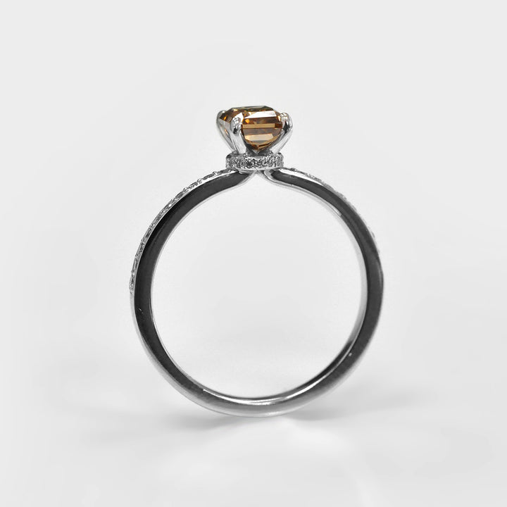 Fancy Brown Radiant Diamond and Side Diamonds Ring.