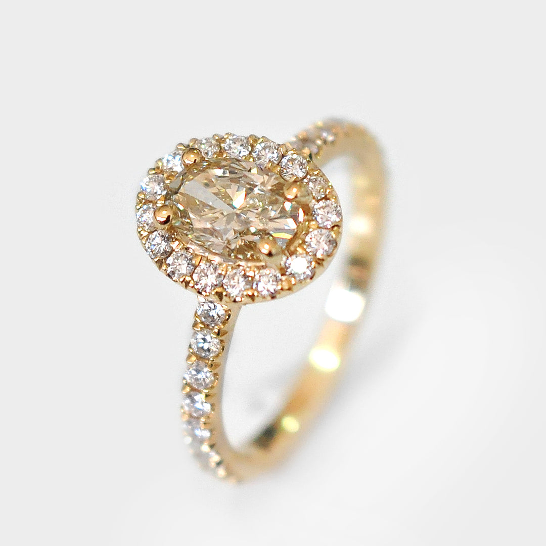 Oval Cut Fancy Yellow Diamond Halo Ring