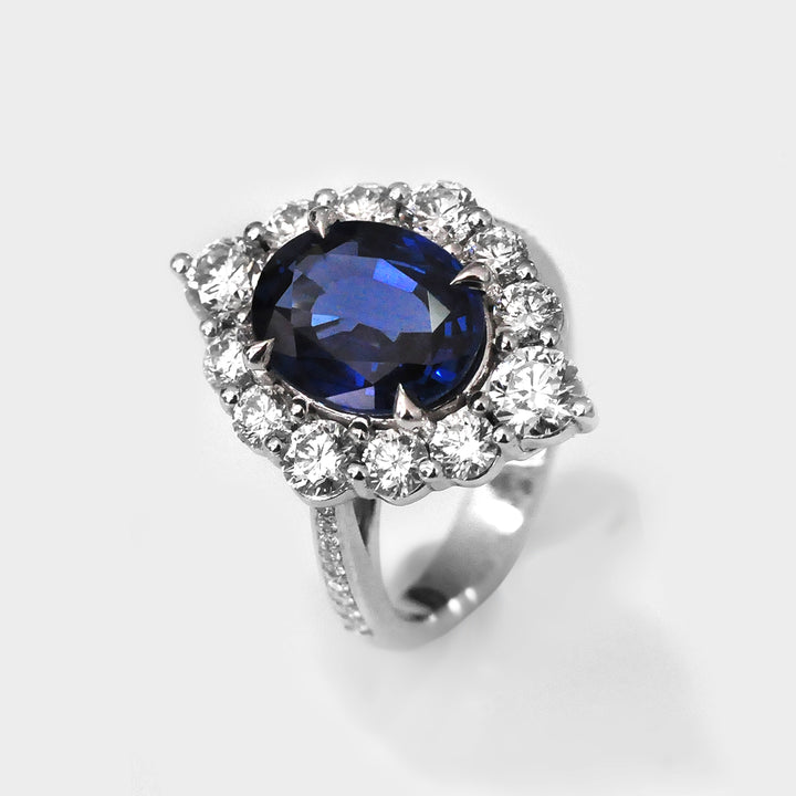 Oval Cut Blue Sapphire and white Diamonds magnificent Ring