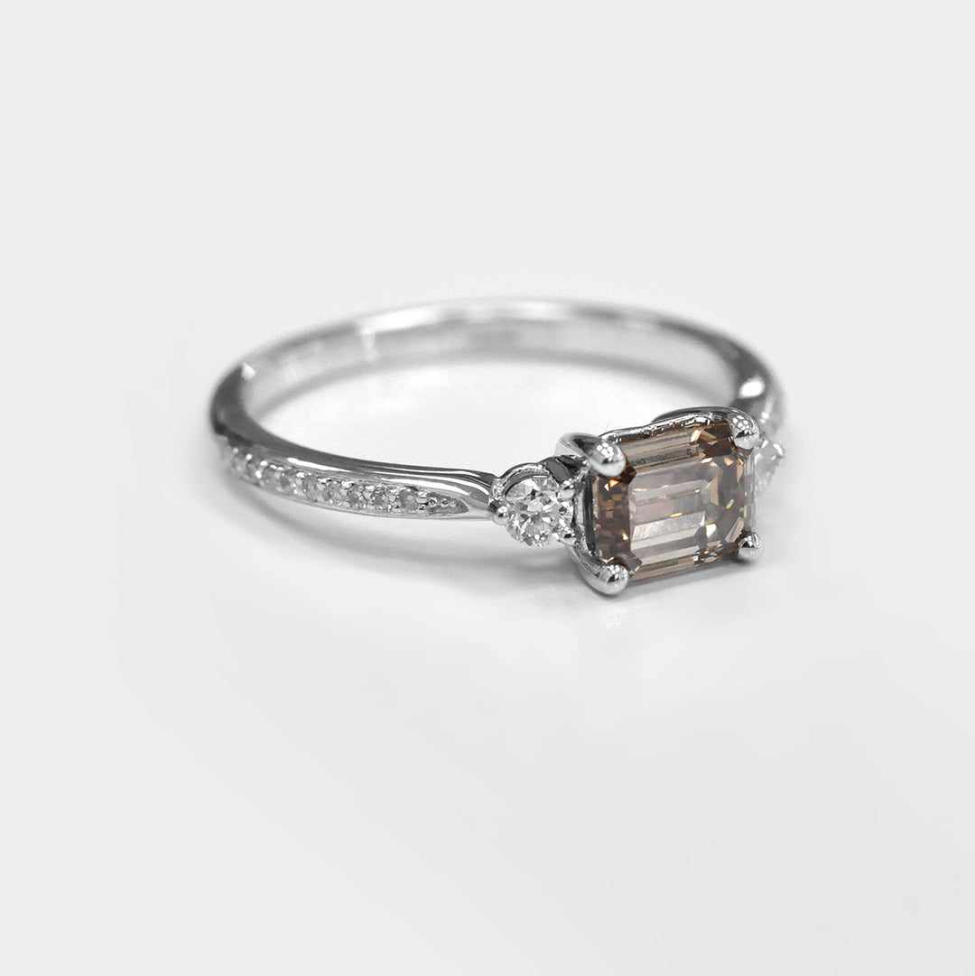 Light Brown Emerald Cut Diamond and Side Diamonds Ring