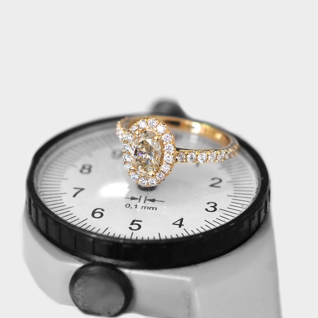 Oval Cut Fancy Yellow Diamond Halo Ring