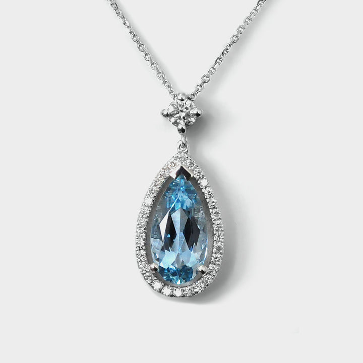Long Pear Shape Aquamarine and Diamonds Halo Pendant
