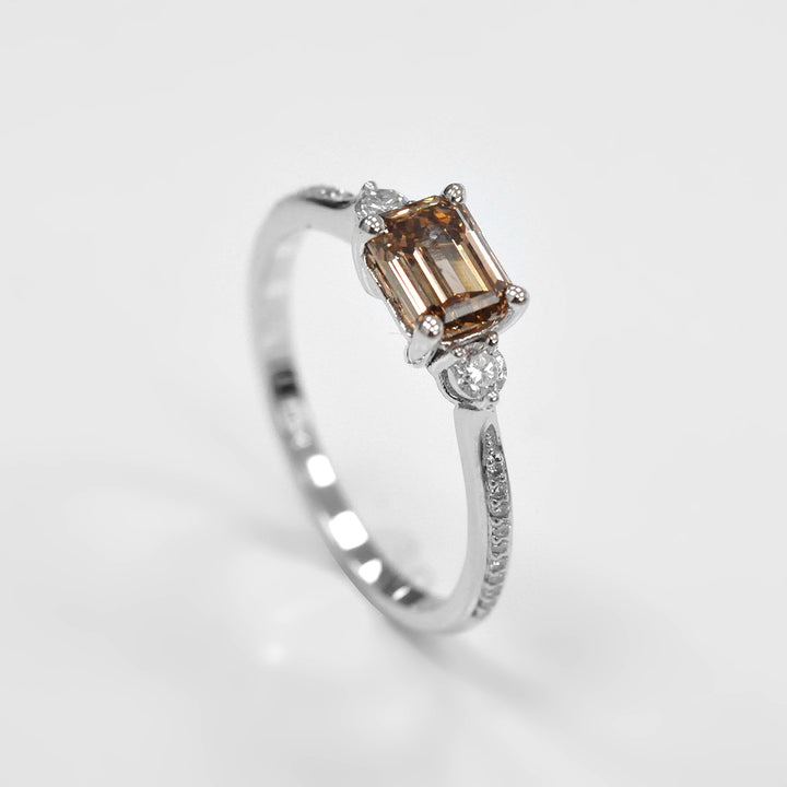 Light Brown Emerald Cut Diamond and Side Diamonds Ring