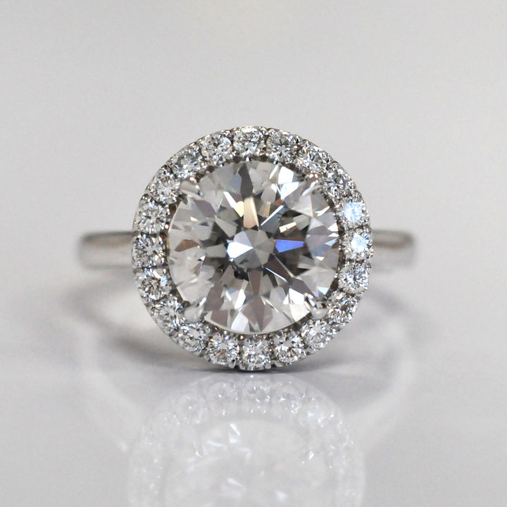 white gold natural diamond (~3.0 ct ) halo engagement ring