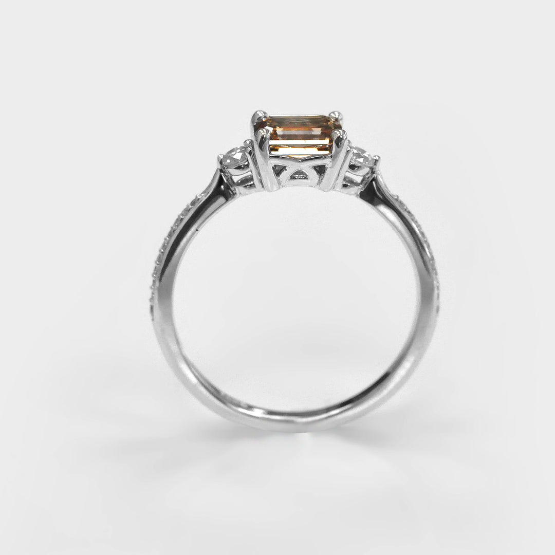 Light Brown Emerald Cut Diamond and Side Diamonds Ring