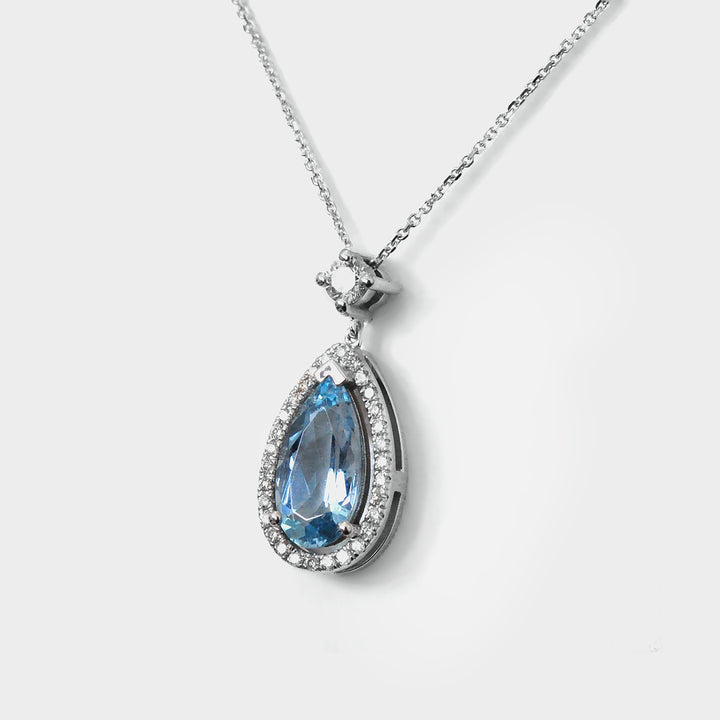 Long Pear Shape Aquamarine and Diamonds Halo Pendant