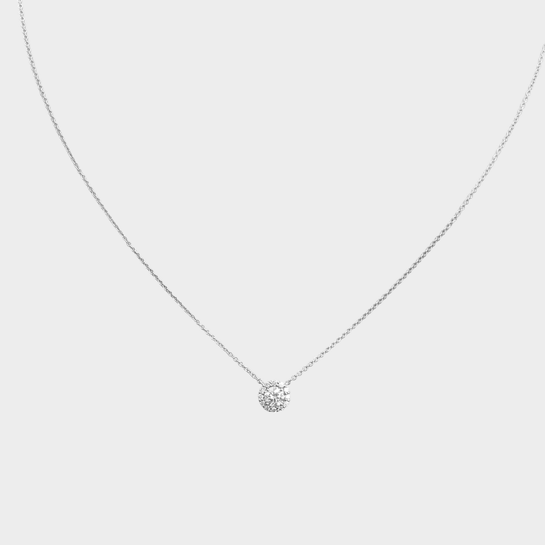 0.35 Carat Center Diamond and Diamonds halo pendant.