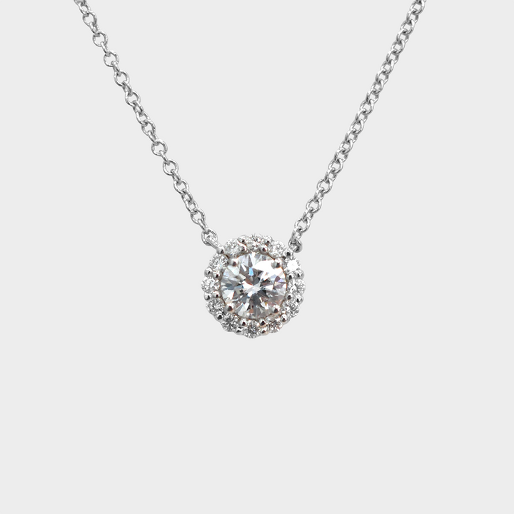0.35 Carat Center Diamond and Diamonds halo pendant.