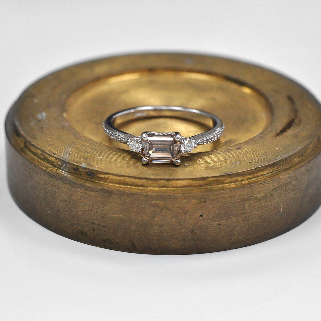 Light Brown Emerald Cut Diamond and Side Diamonds Ring