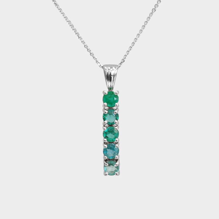 Five Emeralds line Pendant in White Gold