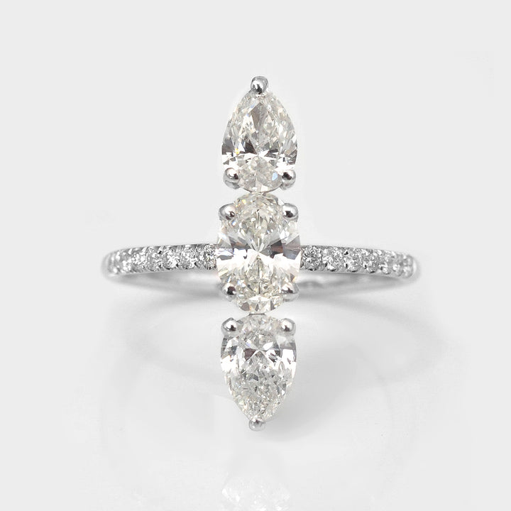 Three Stones Pear and Oval White Diamonds Ring