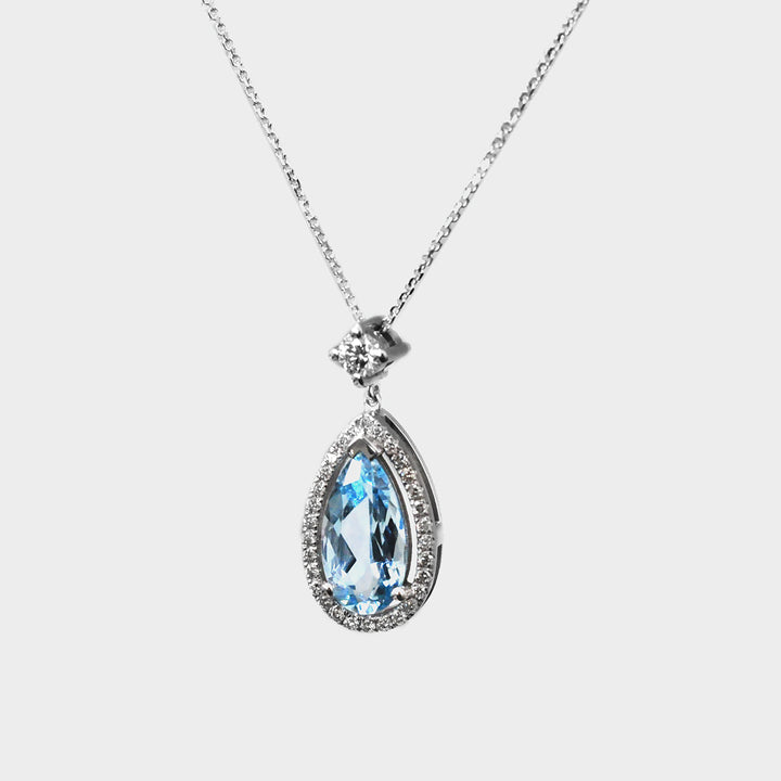 Long Pear Shape Aquamarine and Diamonds Halo Pendant