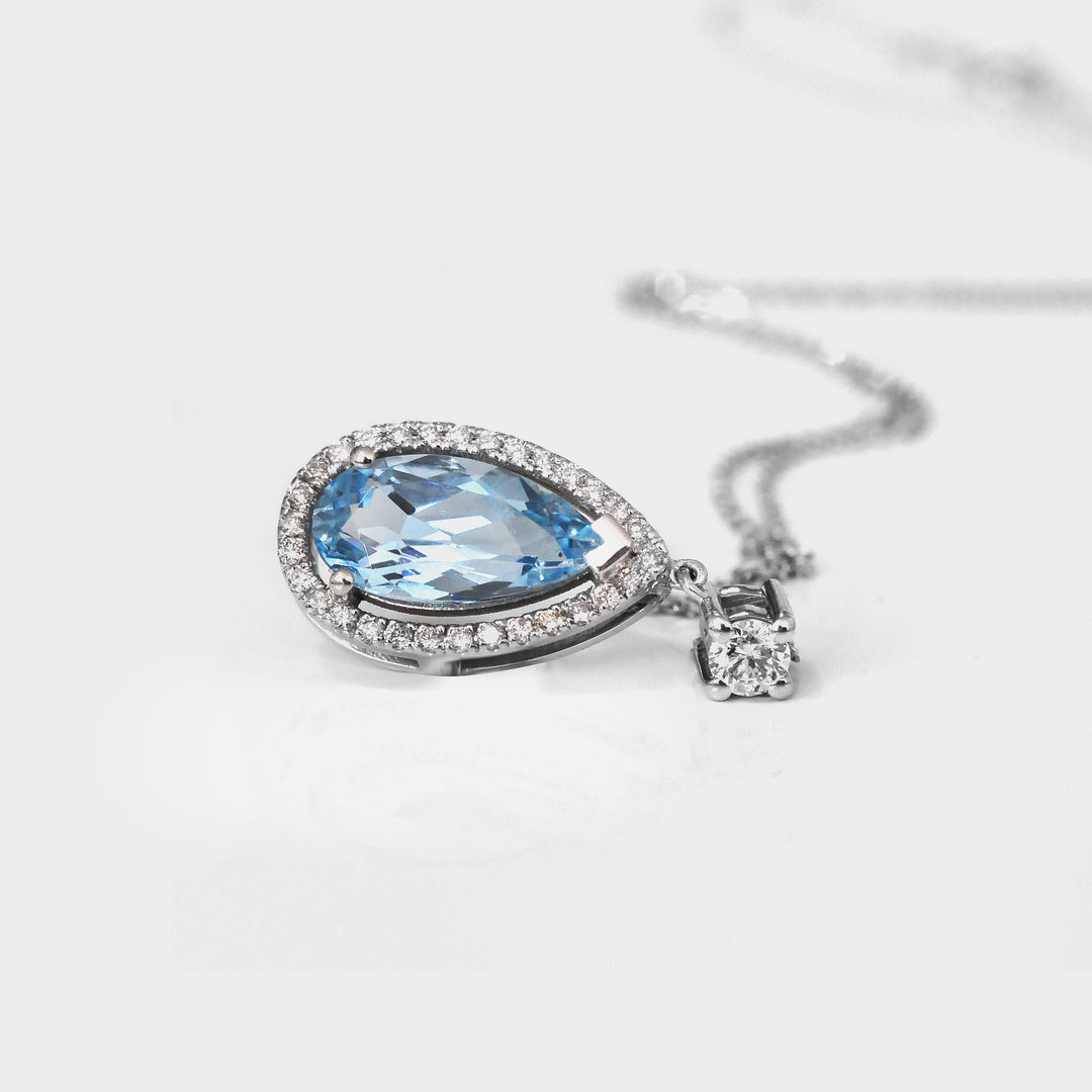 Long Pear Shape Aquamarine and Diamonds Halo Pendant