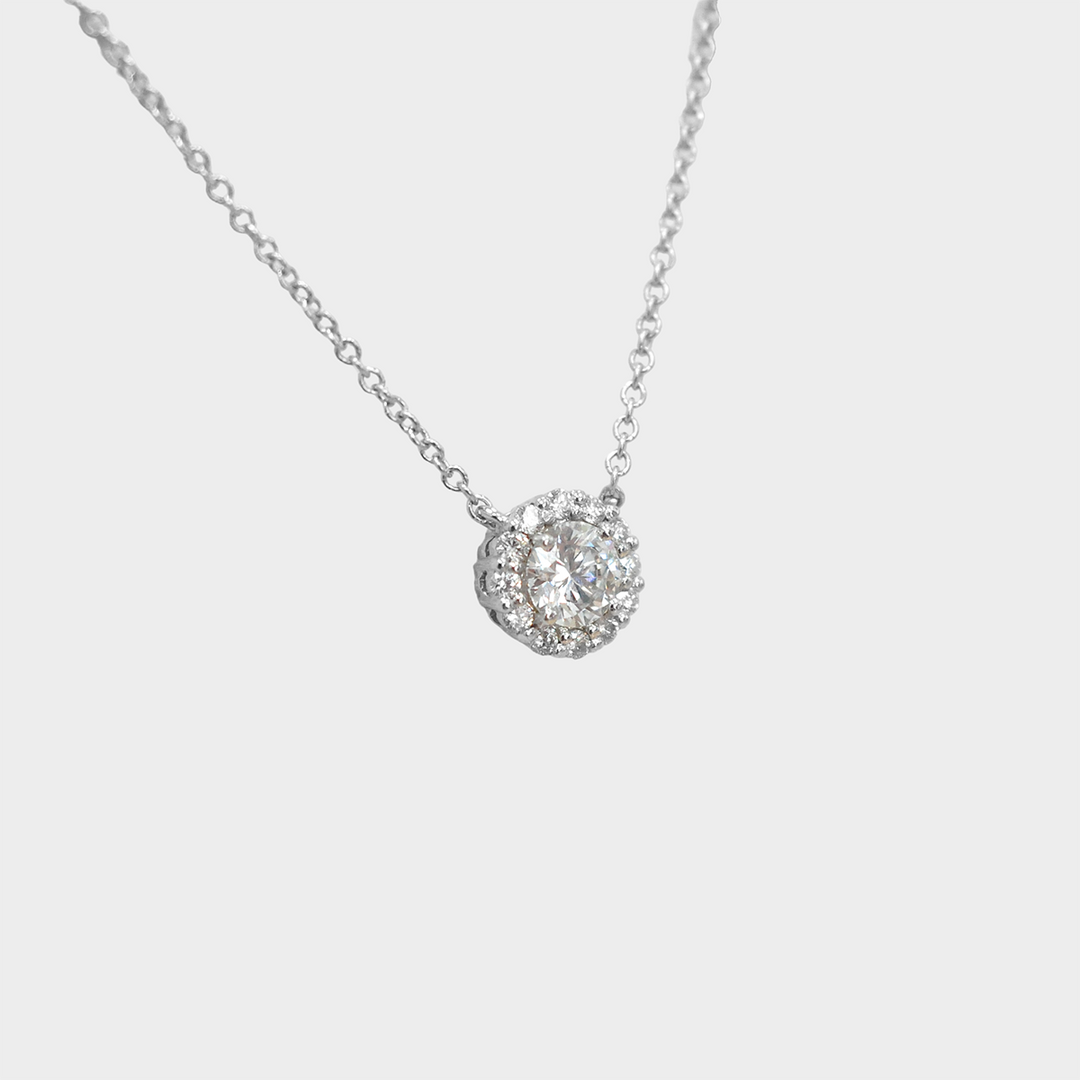0.35 Carat Center Diamond and Diamonds halo pendant.
