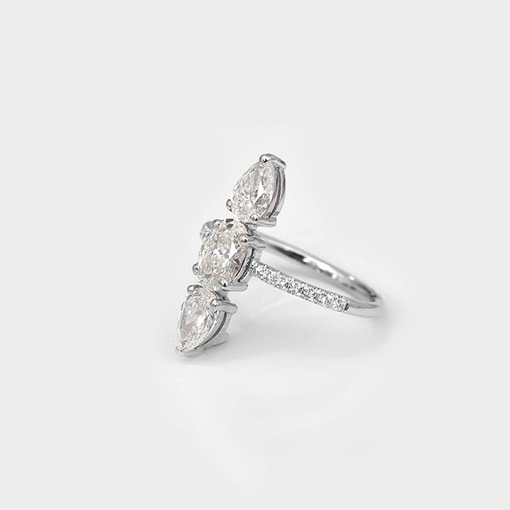 Three Stones Pear and Oval White Diamonds Ring