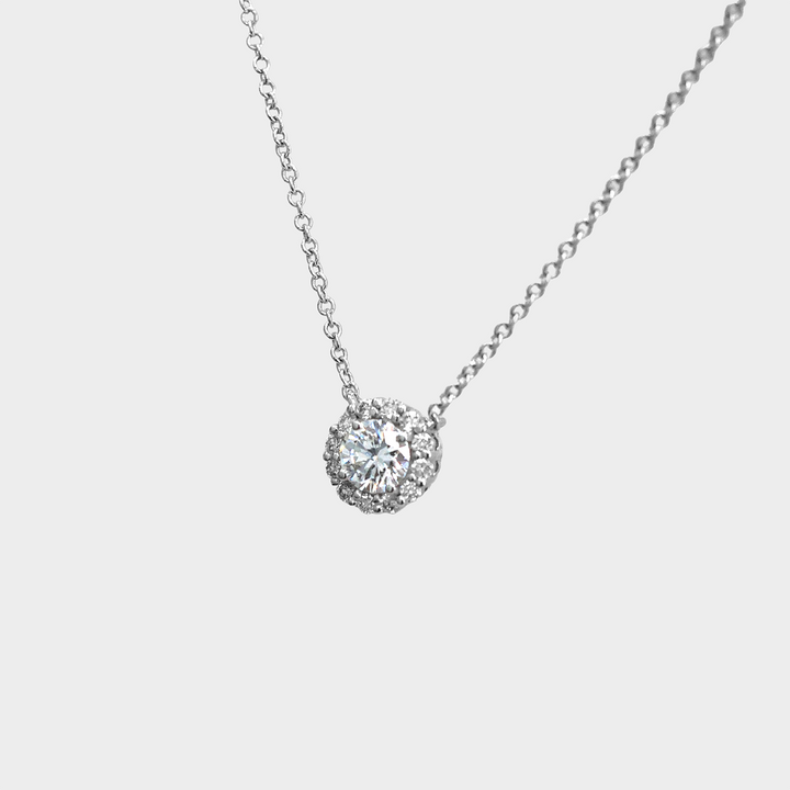 0.35 Carat Center Diamond and Diamonds halo pendant.