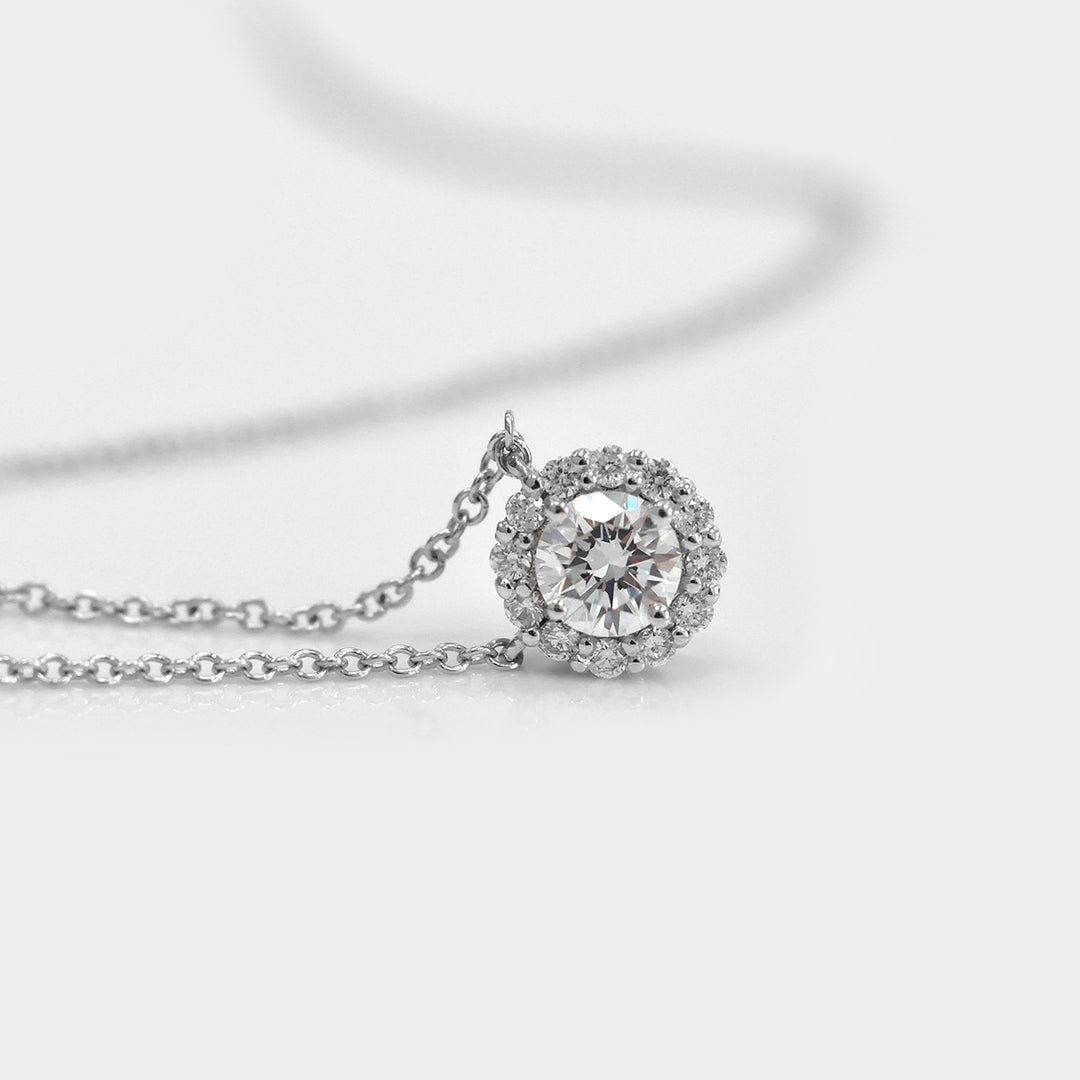 0.35 Carat Center Diamond and Diamonds halo pendant.