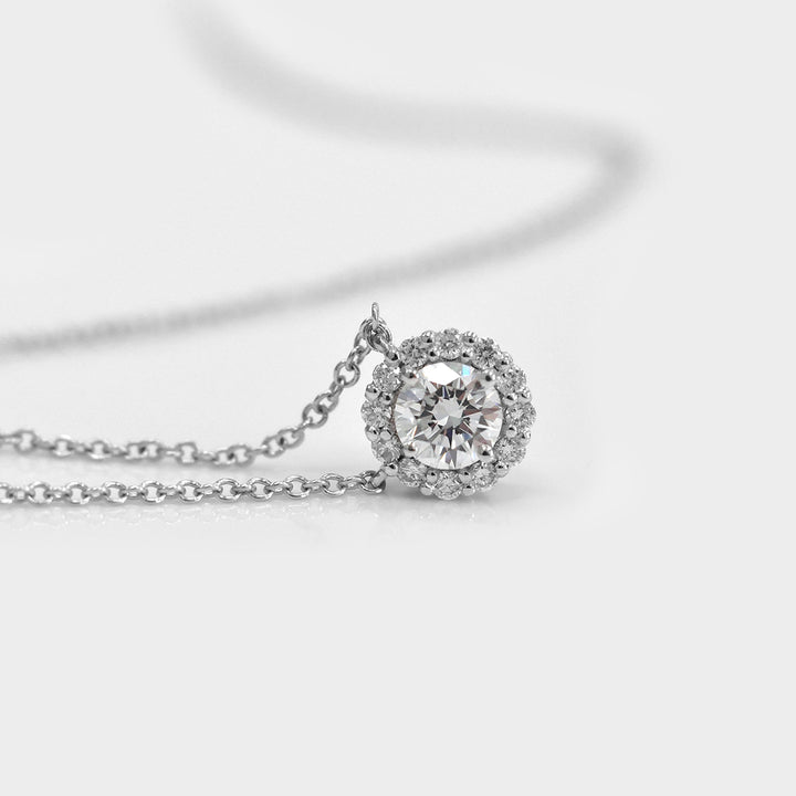 0.35 Carat Center Diamond and Diamonds halo pendant.