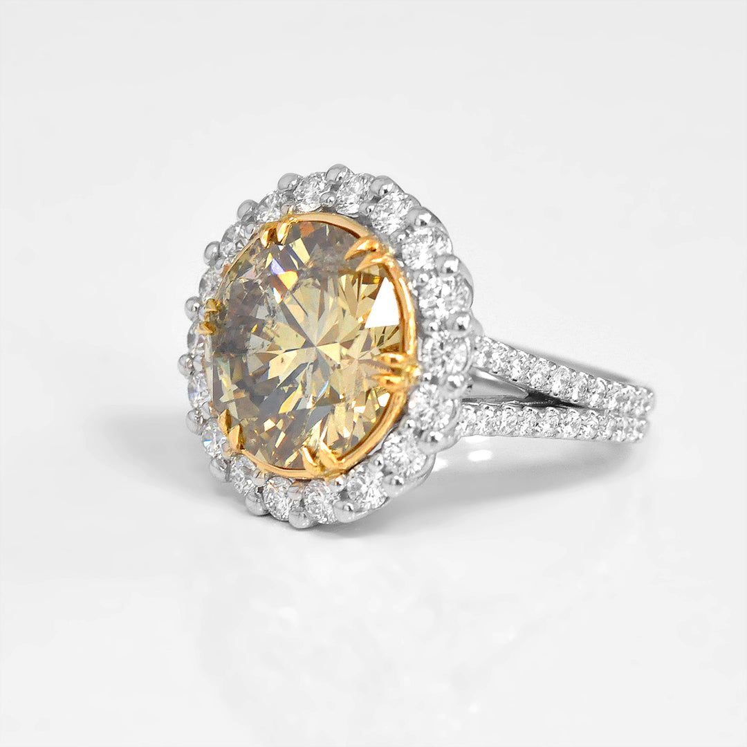 Magnificent 8 carat Yellow Diamond Halo Ring