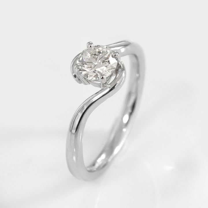 White Diamond twist style Solitaire Ring in White Gold