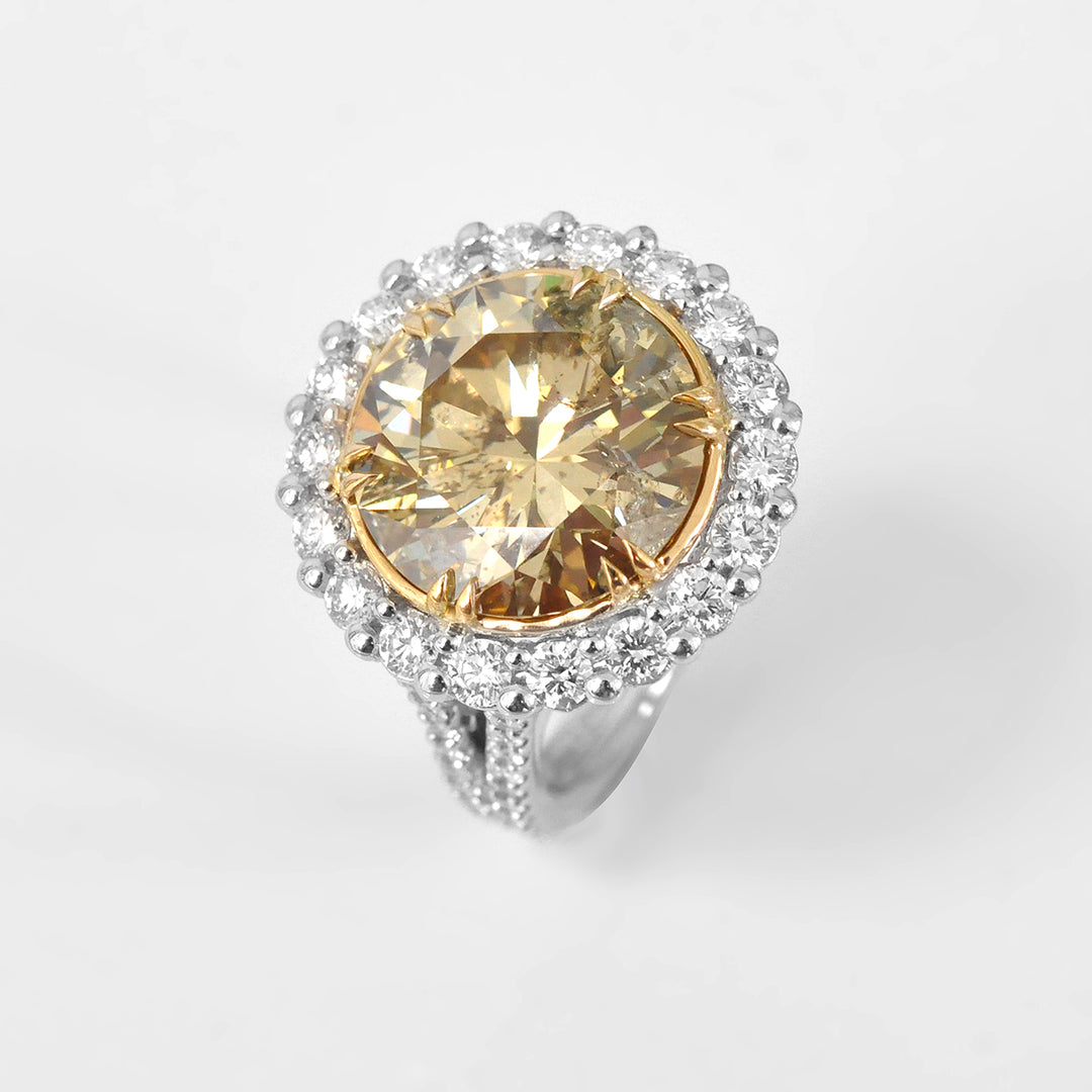 Magnificent 8 carat Yellow Diamond Halo Ring
