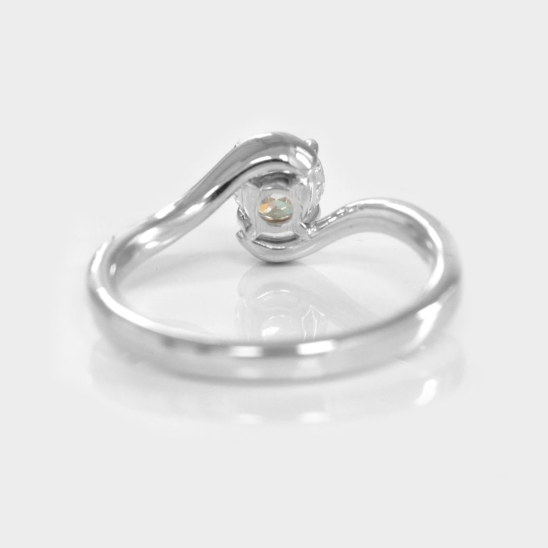 White Diamond twist style Solitaire Ring in White Gold