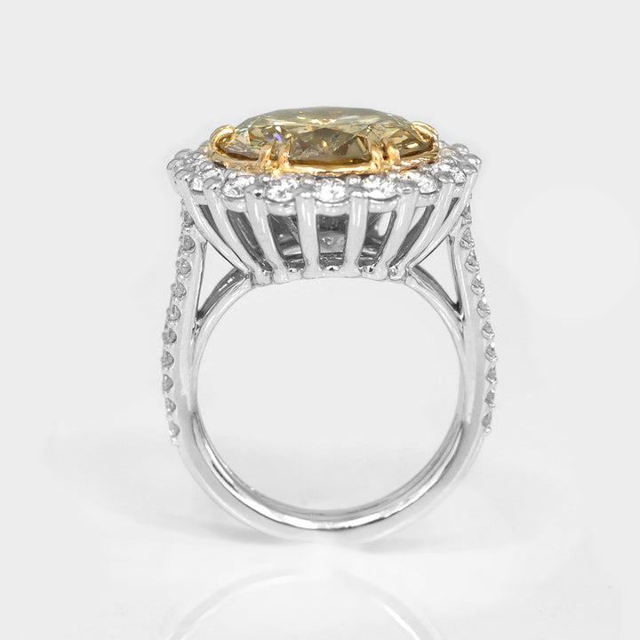 Magnificent 8 carat Yellow Diamond Halo Ring
