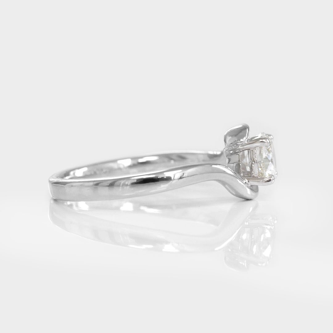 White Diamond twist style Solitaire Ring in White Gold