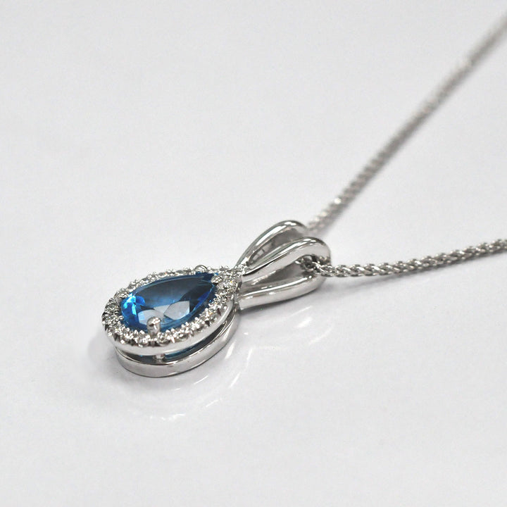 Pear Shape Blue Topaz and Diamonds Pendant