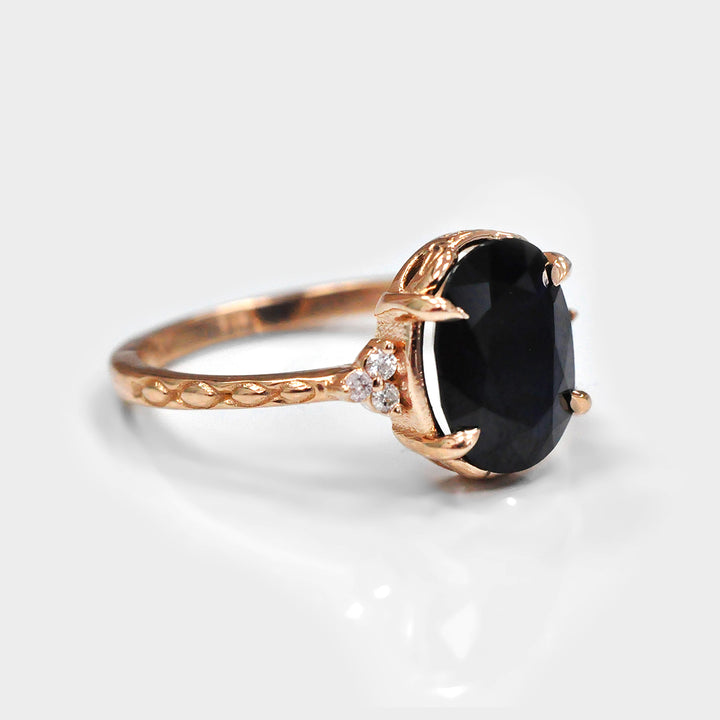 Black Sapphire and Six Side Diamonds Ring