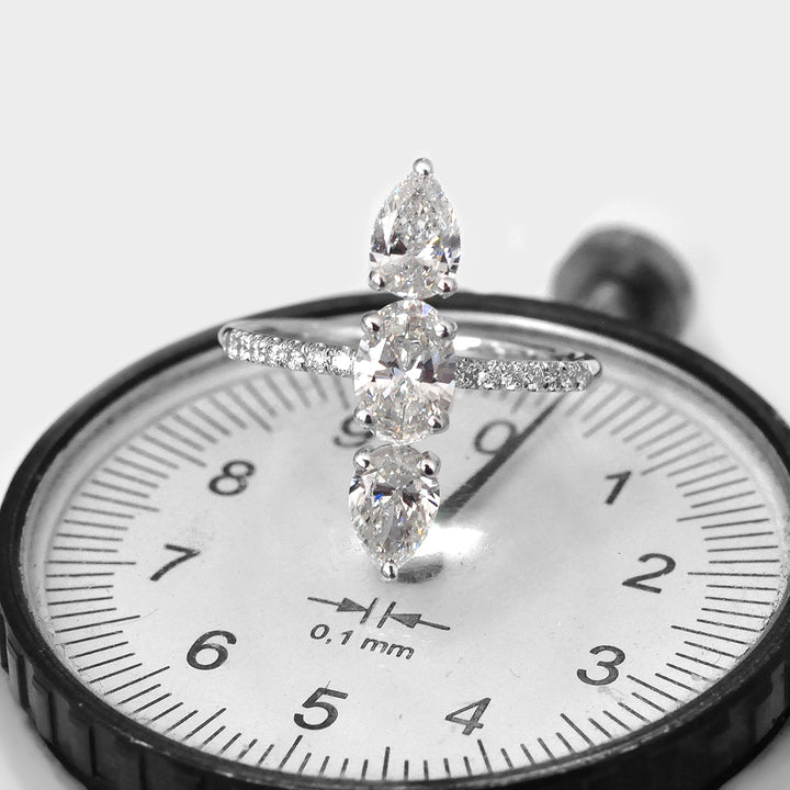 Three Stones Pear and Oval White Diamonds Ring