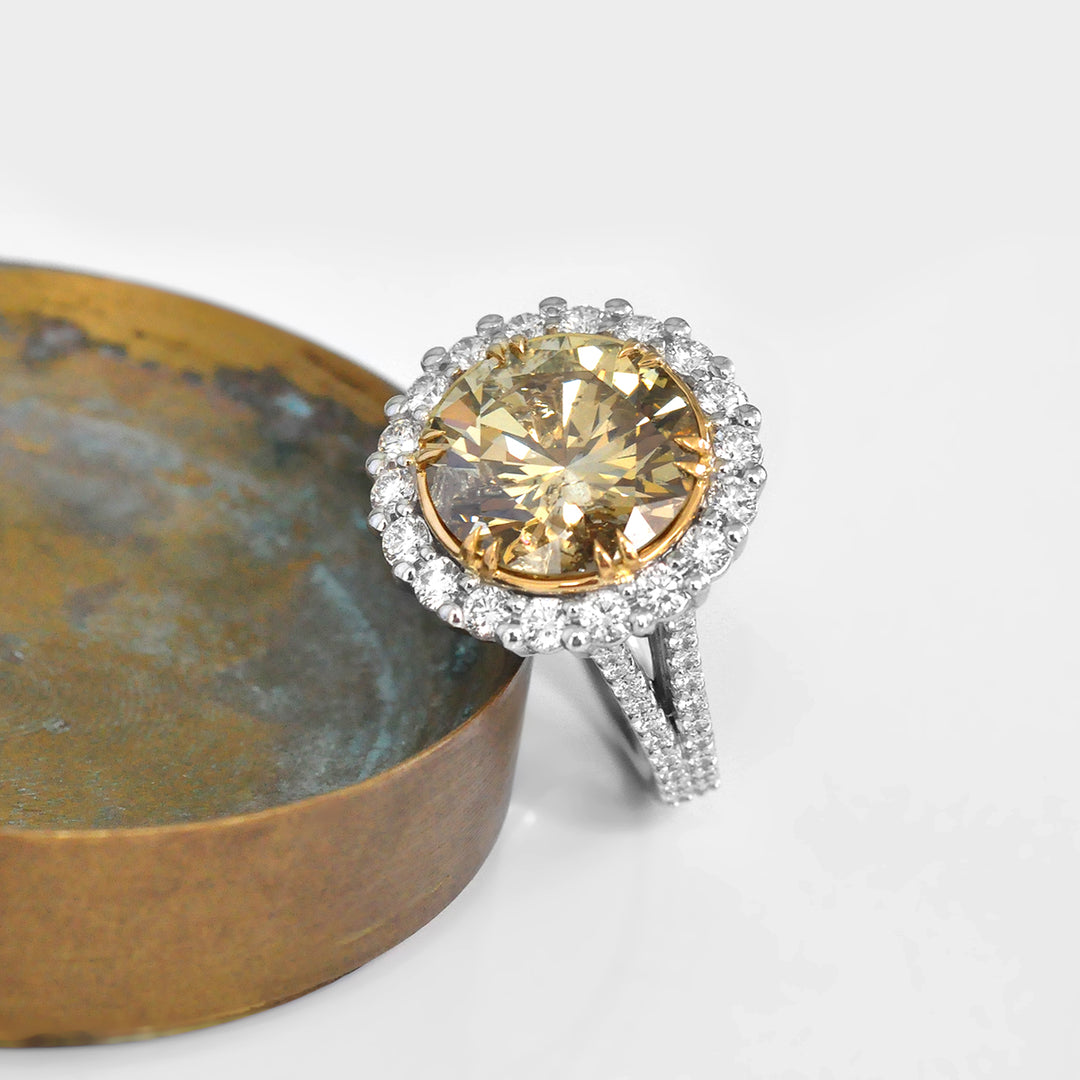 Magnificent 8 carat Yellow Diamond Halo Ring
