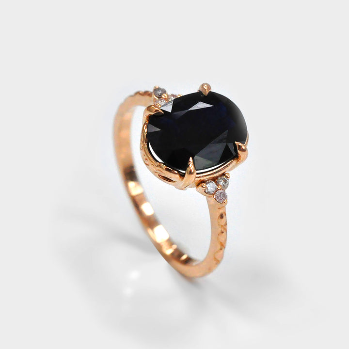 Black Sapphire and Six Side Diamonds Ring